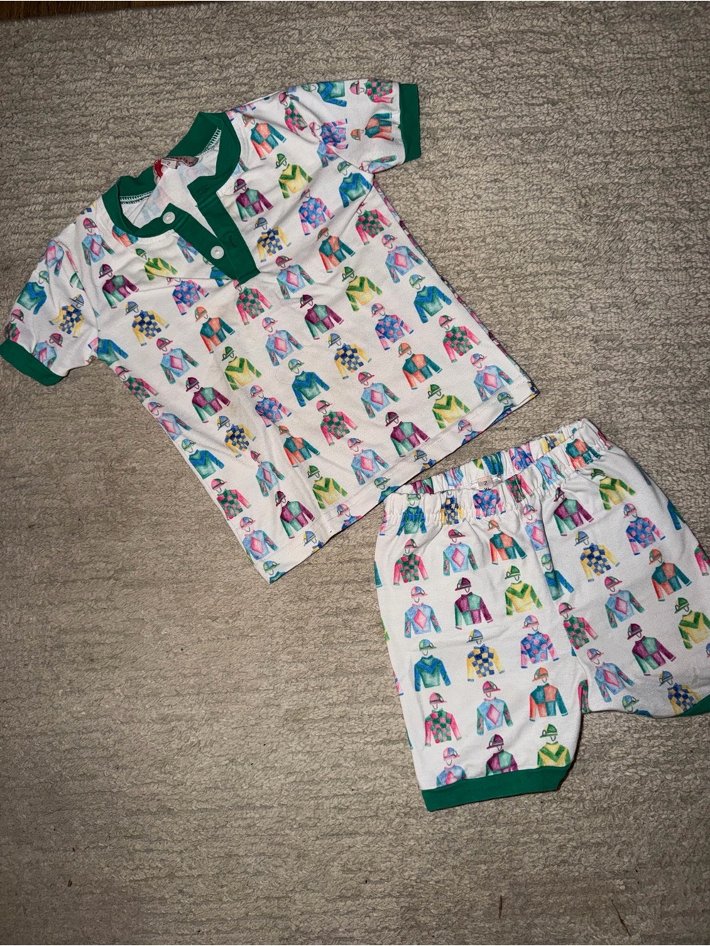 Children's White Pajama Set with Green Trim and Colorful Character Print